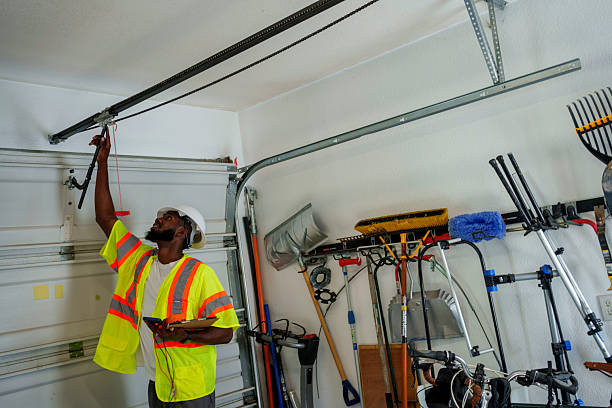Professional Garage Door Panel Replacement technician working in Johnson City, KS